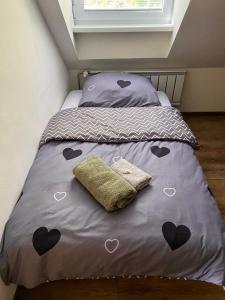 Кровать или кровати в номере Apartmán Zelený dom 43 (2)