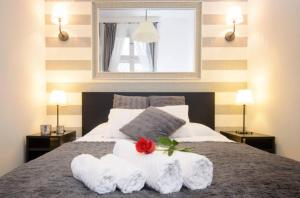Posteľ alebo postele v izbe v ubytovaní Opera Experience Apartment