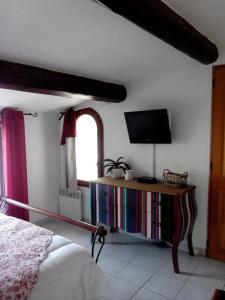 Posteľ alebo postele v izbe v ubytovaní Maison avec Jacuzzi et terrasse sur les toits