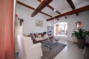 Posedenie v ubytovaní Maison avec Jacuzzi et terrasse sur les toits