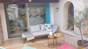 Posedenie v ubytovaní Maison avec Jacuzzi et terrasse sur les toits