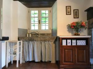 A kitchen or kitchenette at Il Pianetto Holiday Accomodation