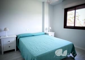 Postel nebo postele na pokoji v ubytování PUSHE Village Playa Granada Beach & Golf 3 + 26 fotografií