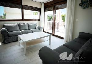 Posezení v ubytování PUSHE Village Playa Granada Beach & Golf 3