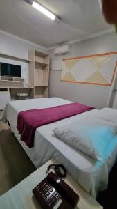 Postel nebo postele na pokoji v ubytování Hotel Porthal da Ilha- Paulo Afonso-Ba