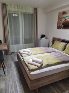 Postel nebo postele na pokoji v ubytování Orchidea2