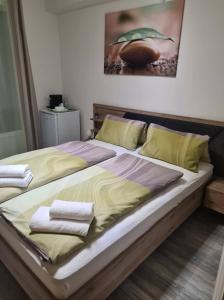 Letto o letti in una camera di Orchidea2