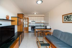 Kuchyňa alebo kuchynka v ubytovaní Apartamento La Perla + 14 fotografií