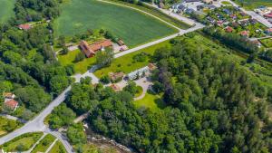 an aerial view of a house in the middle of a forest at Munkedals Herrgård in Munkedal