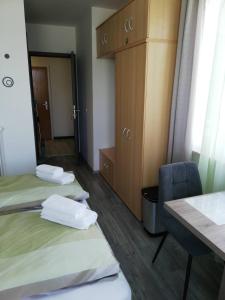 Letto o letti in una camera di Orchidea2