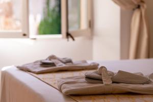 Postel nebo postele na pokoji v ubytování Hotel Can Verdera