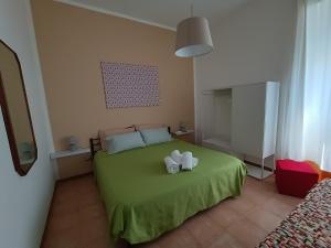 A bed or beds in a room at Hospiton Home