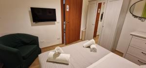 Телевизор и/или развлекательный центр в Studio Flat 381