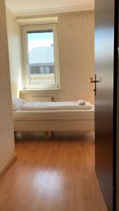 Łóżko lub łóżka w pokoju w obiekcie Hotel Tabor Rooms