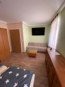 Telewizja i/lub zestaw kina domowego w obiekcie Ratuszowa Noclegi