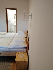 Posteľ alebo postele v izbe v ubytovaní Zempléni Tündérkert vendégház