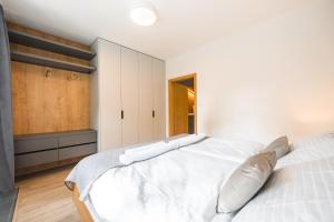 Posteľ alebo postele v izbe v ubytovaní Apartmán U Vlka - Hubertus, Karlova Studánka
