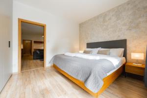 Posteľ alebo postele v izbe v ubytovaní Apartmán U Vlka - Hubertus, Karlova Studánka