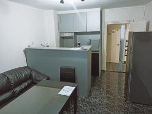 A kitchen or kitchenette at Апартамент Арена Бургас