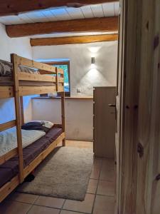 Postel nebo postele na pokoji v ubytování Rustico Tello