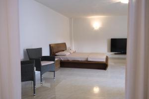 Posezení v ubytování Apartement Paliouri Village + 2 fotografie