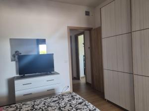 Telewizja i/lub zestaw kina domowego w obiekcie La dolce vita