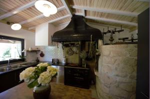 Kuchyň nebo kuchyňský kout v ubytování Casas Viriatus - Turismo Rural