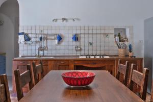 Kuchyň nebo kuchyňský kout v ubytování Casa del gelso bianco
