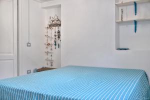 Postel nebo postele na pokoji v ubytování Casa del gelso bianco