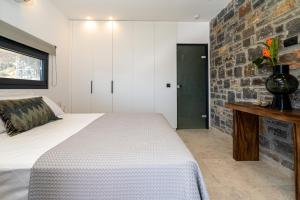 Postel nebo postele na pokoji v ubytování Celine Private Residences