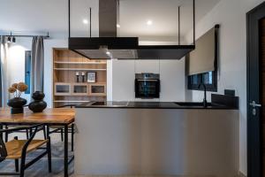Kuchyň nebo kuchyňský kout v ubytování Celine Private Residences