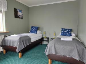 מיטה או מיטות בחדר ב-550 Guesthouse