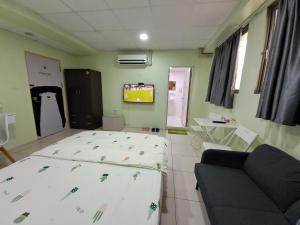 Postelja oz. postelje v sobi nastanitve Ming House