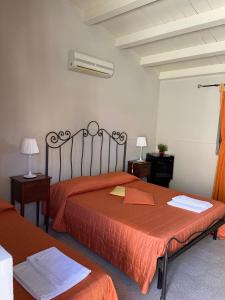Letto o letti in una camera di Borgo Nocchiara