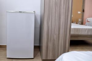Posteľ alebo postele v izbe v ubytovaní B&B Bouganville
