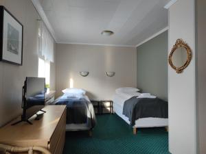 550 Guesthouse客房内的一张或多张床位