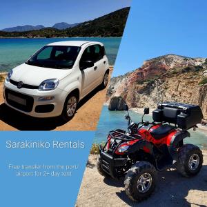 a atv parked on the beach next to a white car at Sarakiniko Rooms in Adamantas