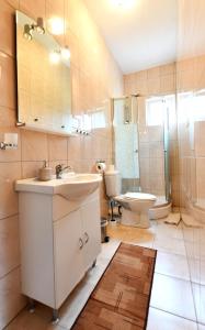 Kúpeľňa v ubytovaní Apartments Alan