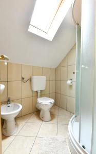 Kúpeľňa v ubytovaní Apartments Alan