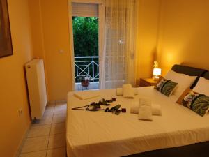 Posteľ alebo postele v izbe v ubytovaní Blue Dolphins Apartment