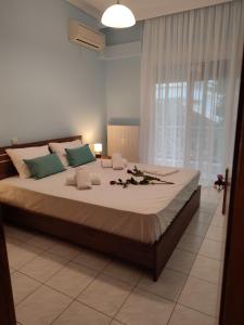 Posteľ alebo postele v izbe v ubytovaní Blue Dolphins Apartment