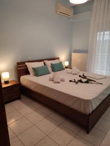 Posteľ alebo postele v izbe v ubytovaní Blue Dolphins Apartment
