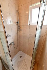 Kúpeľňa v ubytovaní Apartments Alan