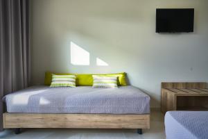 Letto o letti in una camera di Grapevines Hotel