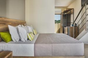 Letto o letti in una camera di Grapevines Hotel