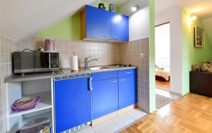 Kuchyňa alebo kuchynka v ubytovaní Apartments Alan