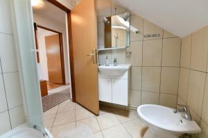 Kúpeľňa v ubytovaní Apartments Alan