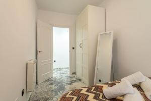Postel nebo postele na pokoji v ubytování Exclusivo Piso Granada, PARKING PRIVADO OPCIONAL