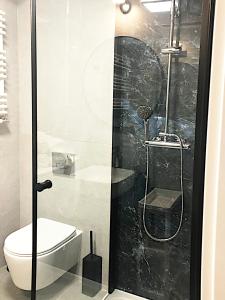 Ένα μπάνιο στο Apartimento Hydral Spero