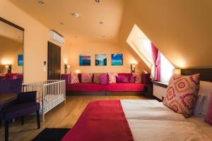 Postel nebo postele na pokoji v ubytování Tópart Hotel